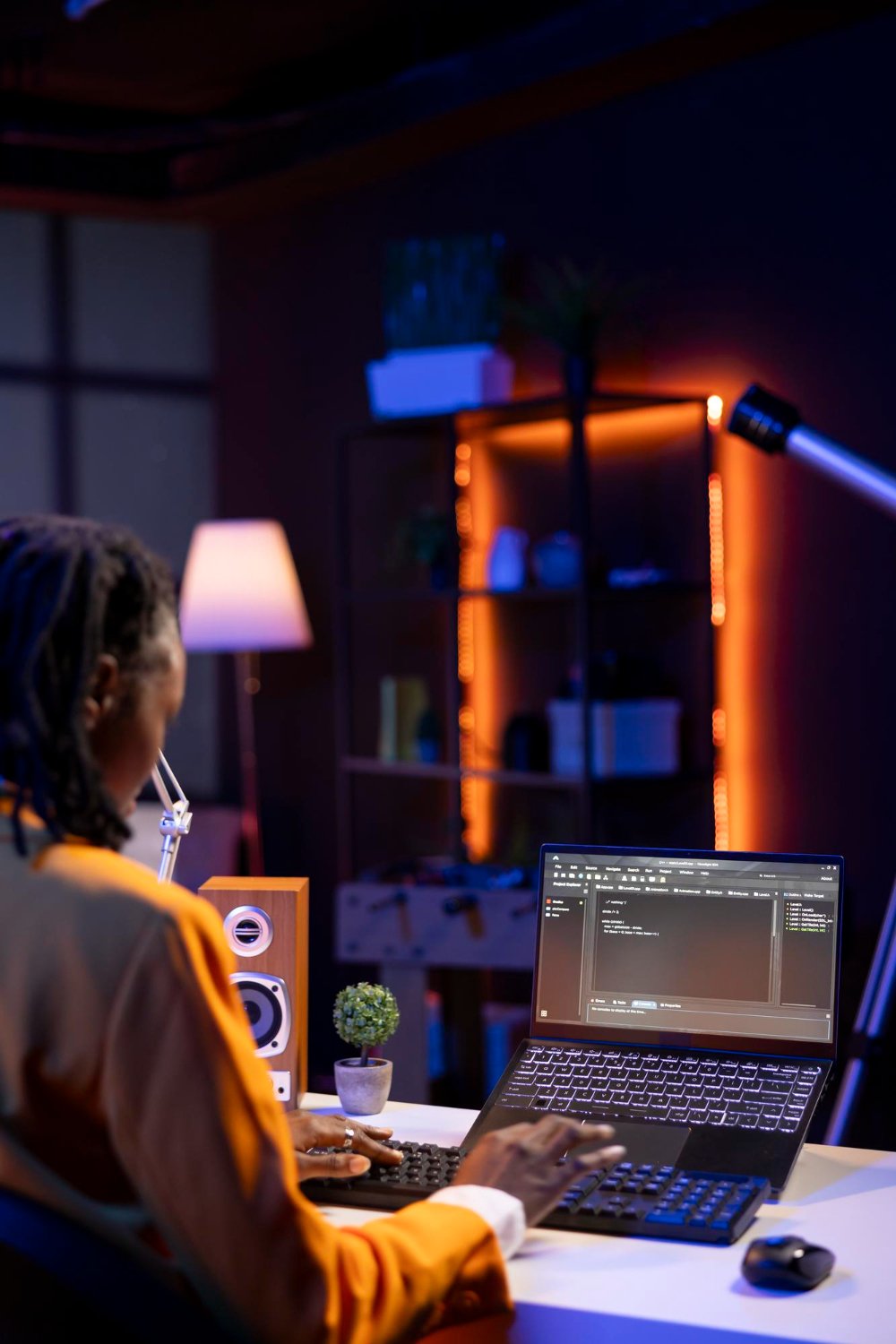 Computer scientist coding on laptop for WordPress development