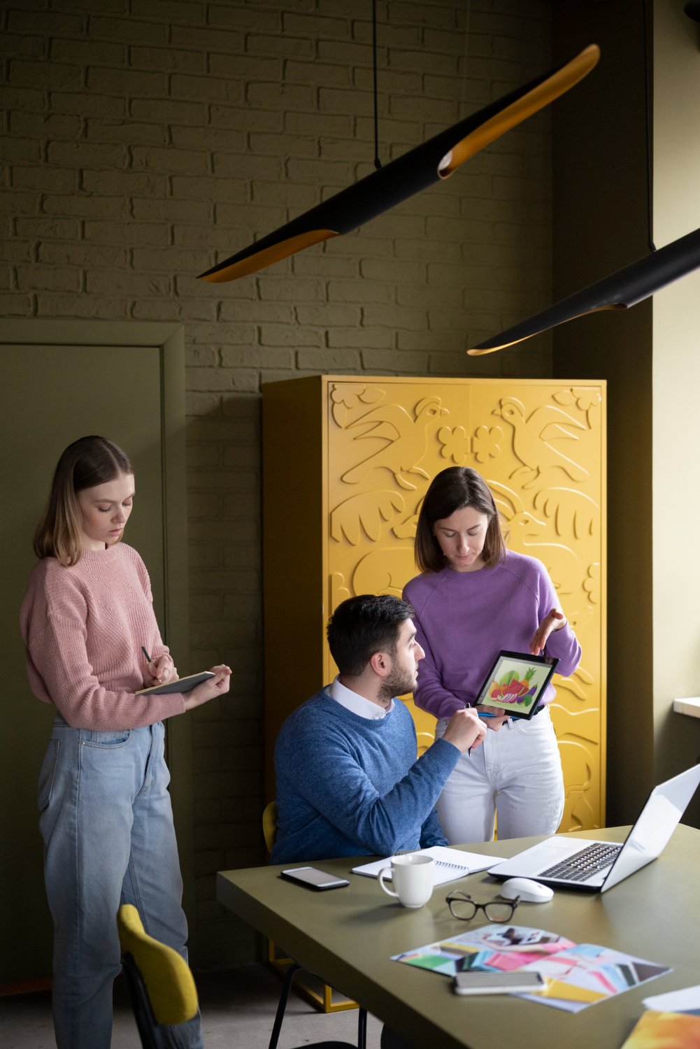 Digital marketing team working together in a modern office