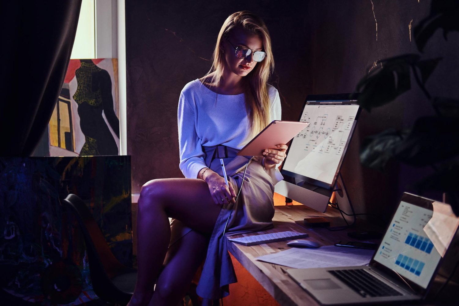 office workspace with laptop and documents for content writing services and digital projects