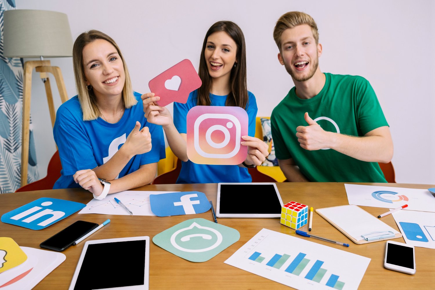 Social media marketing team holding snapchat logo
