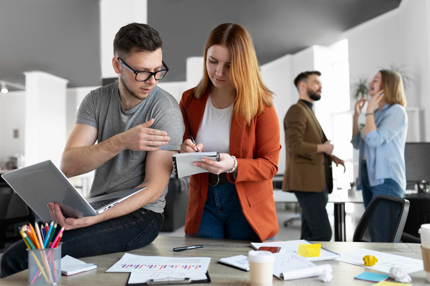Young professionals having a business meeting in office